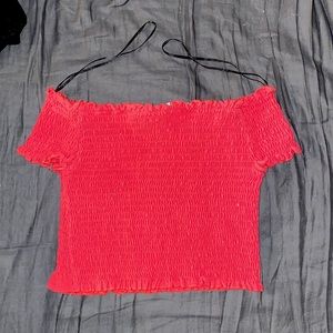 Red off the shoulder crop top.